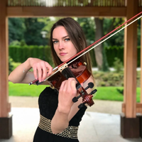 Violinist playing outdoors